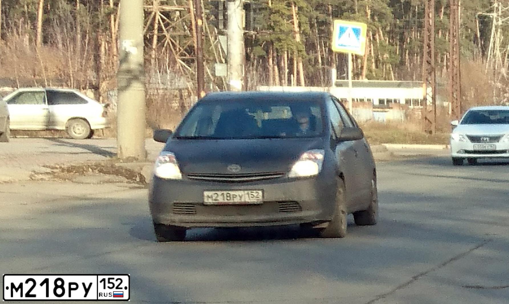 Фото автомобиля TOYOTA PRIUS, 2009 — госномер М218РУ152. Цвет: СЕРЫЙ