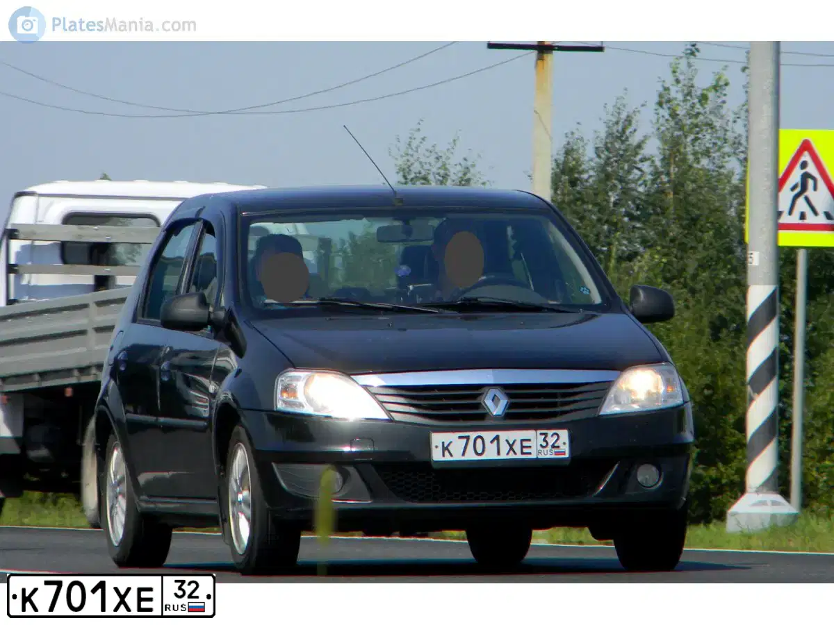 Фото автомобиля RENAULT LOGAN, 2010 — госномер К701ХЕ32. Цвет: ЧЕРНЫЙ