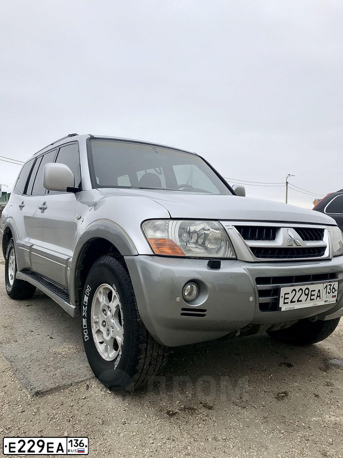 Фото автомобиля MITSUBISHI PAJERO, 2003 — госномер Н815НН36. Цвет: Серебристый