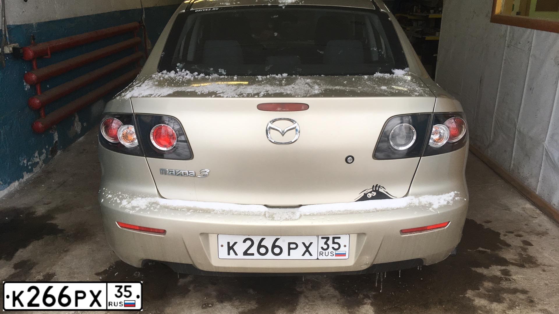 Фото автомобиля MAZDA 3, 2007 — госномер К266РХ35. Цвет: СЕРО-ЗОЛОТИСТЫЙ