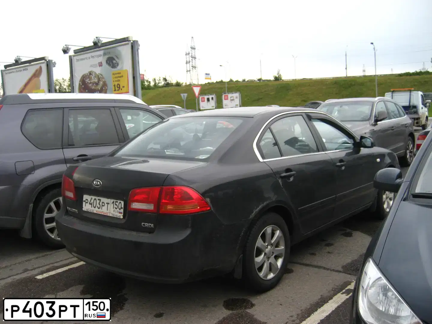 Фото автомобиля KIA OPTIMA, 2008 — госномер Х451КМ71. Цвет: ЧЕРНЫЙ