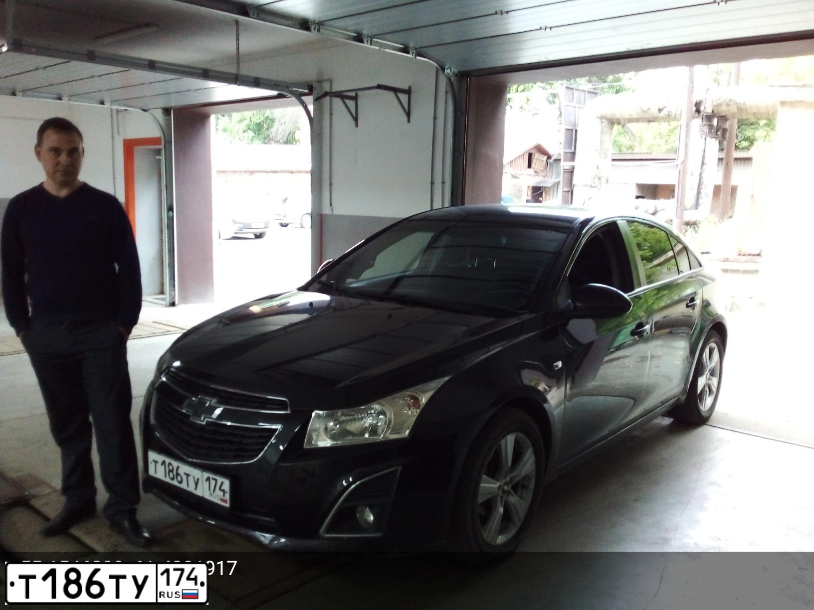 Фото автомобиля CHEVROLET CRUZE, 2013 — госномер Т186ТУ174. Цвет: ЧЕРНЫЙ МЕТАЛЛИК