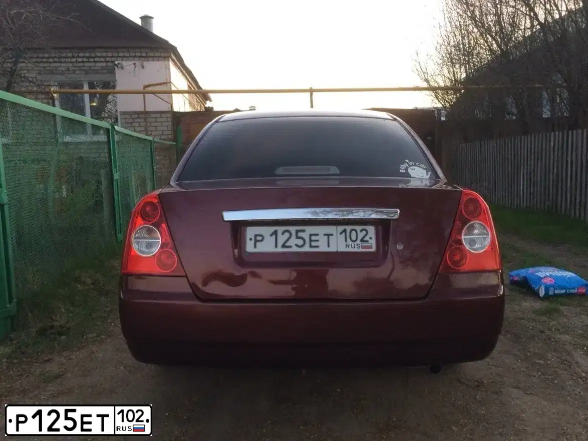Фото автомобиля TAGAZ VORTEX ESTINA, 2010 — госномер Р125ЕТ102. Цвет: Красный