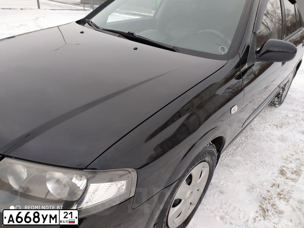 Фото автомобиля NISSAN ALMERA, 2010 — госномер О349НЕ154. Цвет: ЧЕРНЫЙ