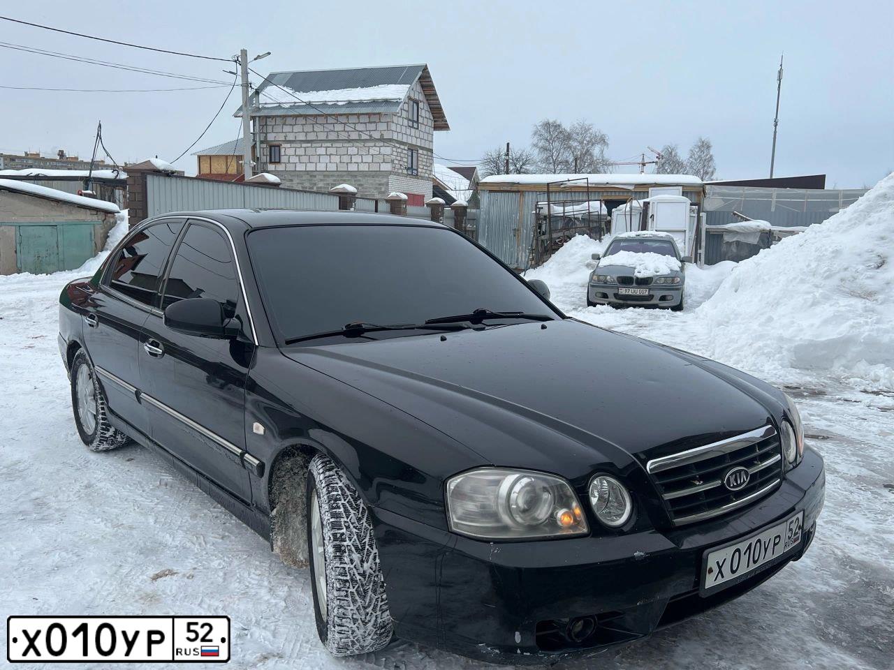 Фото автомобиля KIA MAGENTIS / OPTIMA, 2005 — госномер Х010УР52. Цвет: ЧЕРНЫЙ