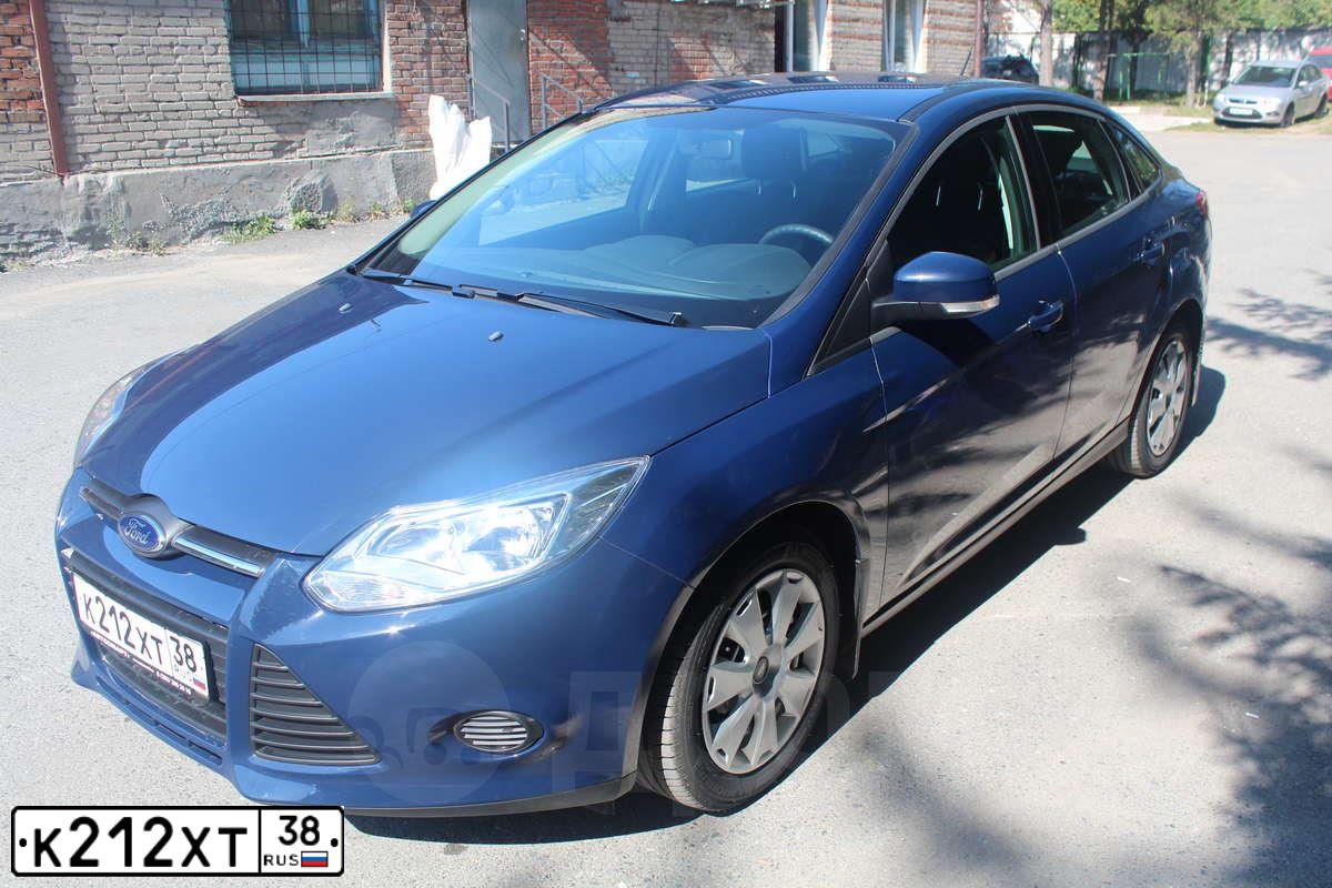 Фото автомобиля FORD FOCUS, 2013 — госномер С313ТМ70. Цвет: Темно-синий