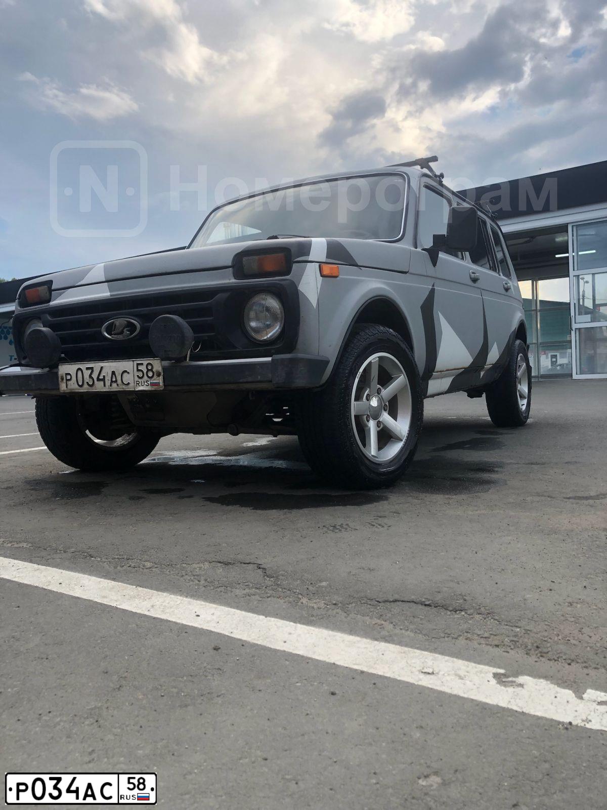 Фото автомобиля LADA 2131 NIVA, 2007 — госномер Р034АС58. Цвет: СВЕТЛО-СЕРЕБРИСТЫЙ МЕТАЛЛ