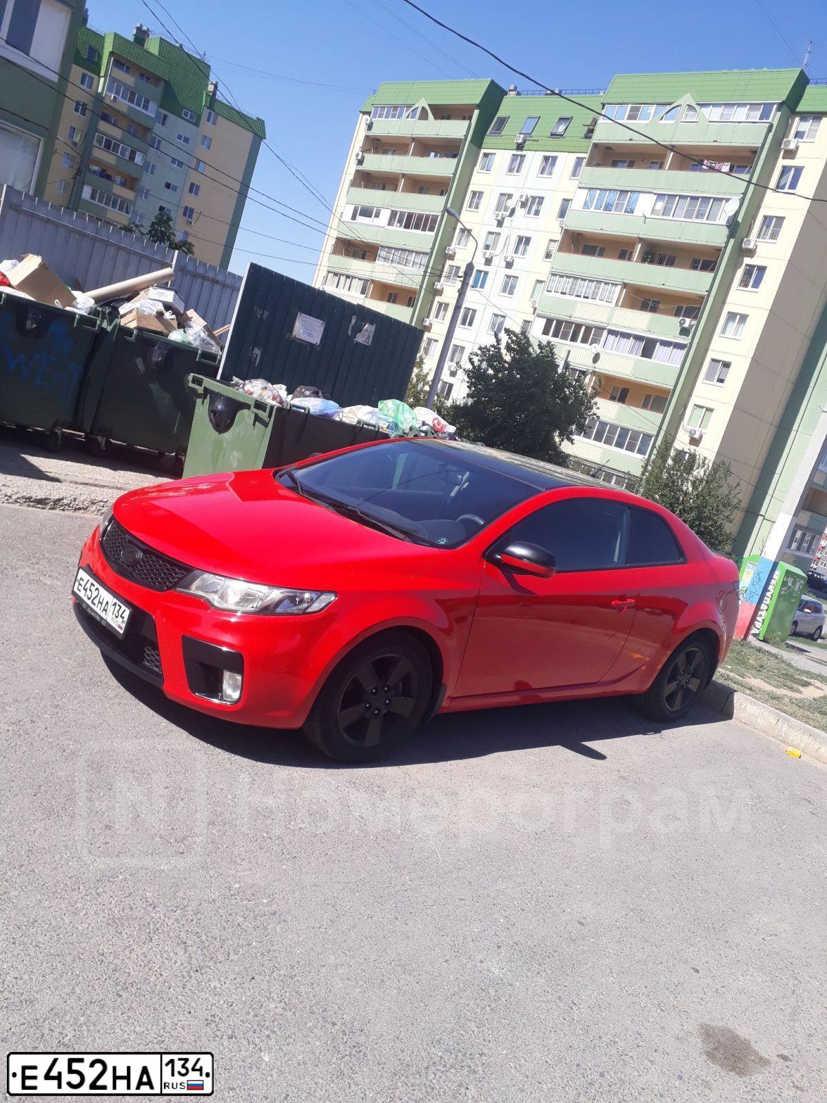 Фото автомобиля KIA CERATO, 2011 — госномер Е452НА134. Цвет: Красный