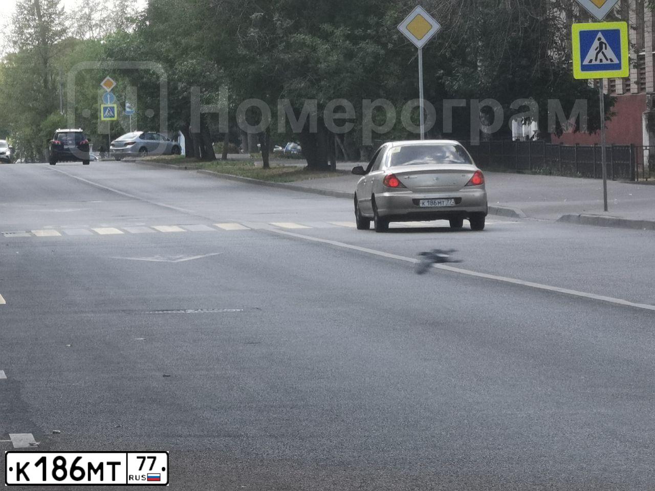 Фото автомобиля KIA SPECTRA, 2007 — госномер К186МТ77. Цвет: ЗОЛОТИСТО-БЕЖЕВЫЙ