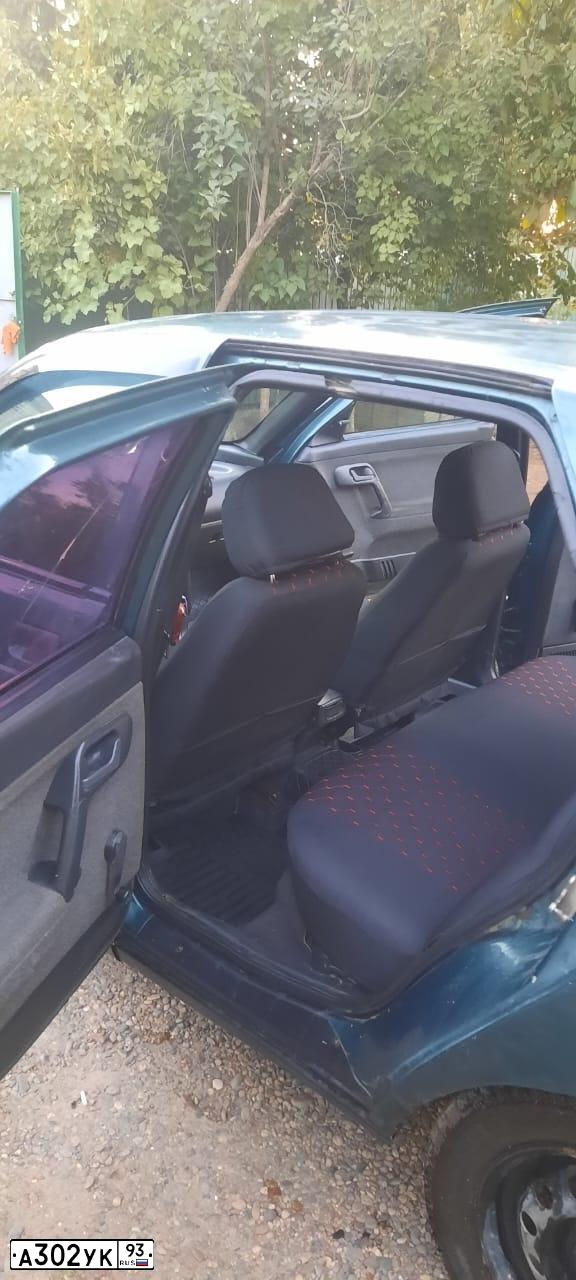 Фото автомобиля LADA 2110, 2001 — госномер В776УС01. Цвет: СЕРЕБРИСТО-ЗЕЛЕНЫЙ