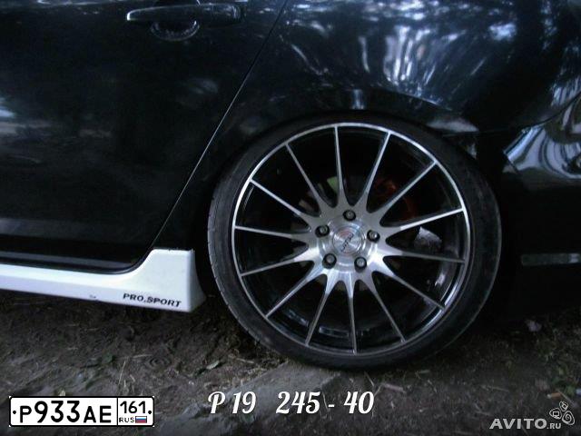 Фото автомобиля MAZDA A 3, 2007 — госномер Р933АЕ161. Цвет: ЧЕРНЫЙ