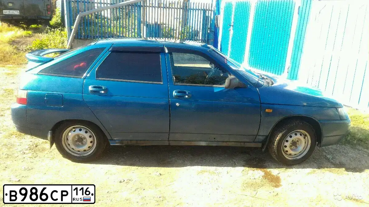 Фото автомобиля LADA 2112, 2004 — госномер В986СР116. Цвет: Сине-зеленый