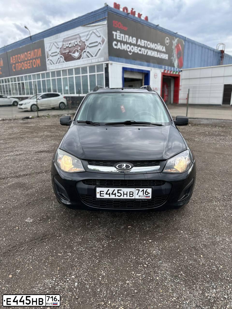 Фото автомобиля LADA 2194 KALINA, 2014 — госномер Е445НВ716. Цвет: Сине-Черный