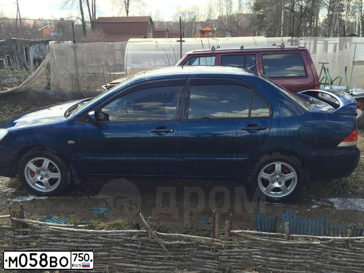Фото автомобиля MITSUBISHI LANCER, 2005 — госномер О896МЕ134. Цвет: синий