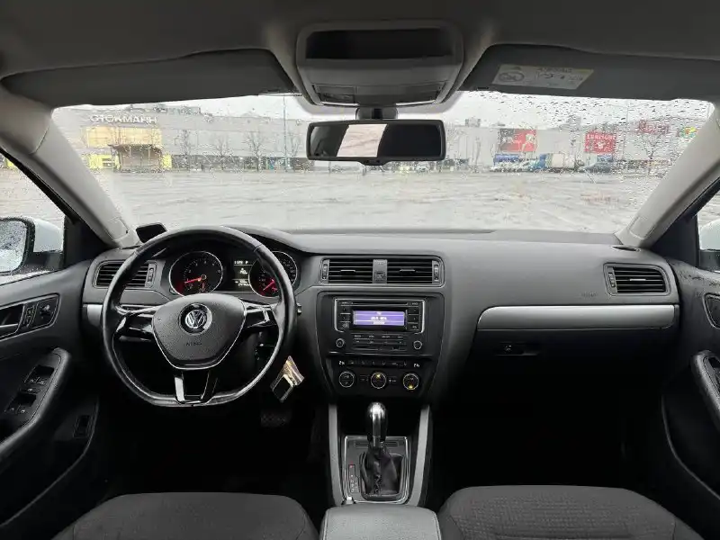 Фото автомобиля VOLKSWAGEN JETTA, 2016 — госномер Н657РР777. Цвет: Белый