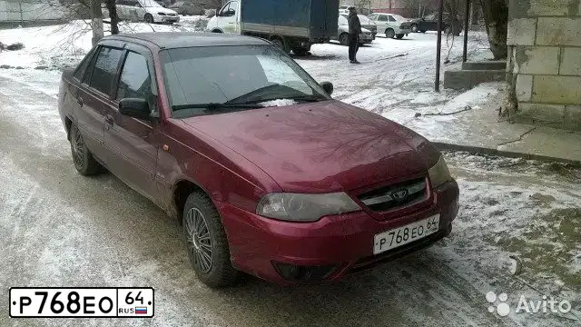 Фото автомобиля DAEWOO NEXIA, 2011 — госномер Р768ЕО64. Цвет: СПЕЛАЯ ВИШНЯ