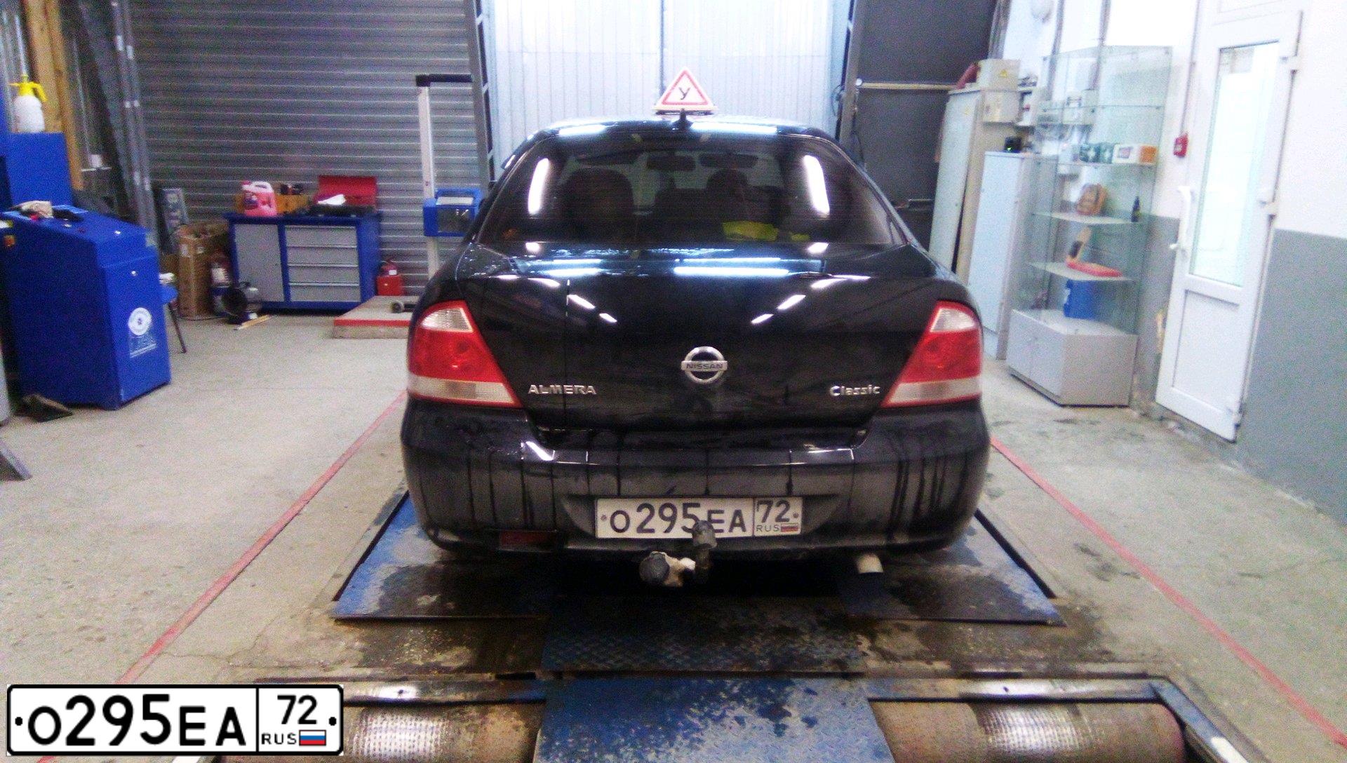 Фото автомобиля NISSAN ALMERA, 2006 — госномер О295ЕА72. Цвет: ЧЕРНЫЙ