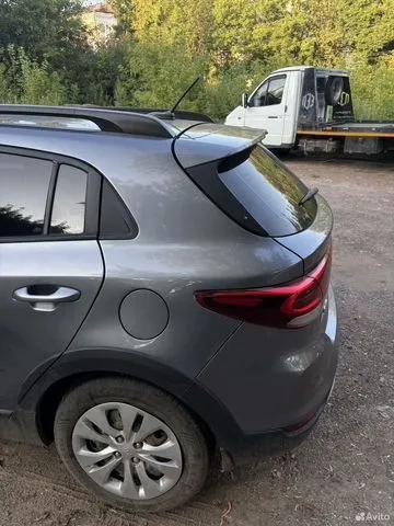Фото автомобиля KIA RIO, 2019 — госномер О910МТ702. Цвет: Серый