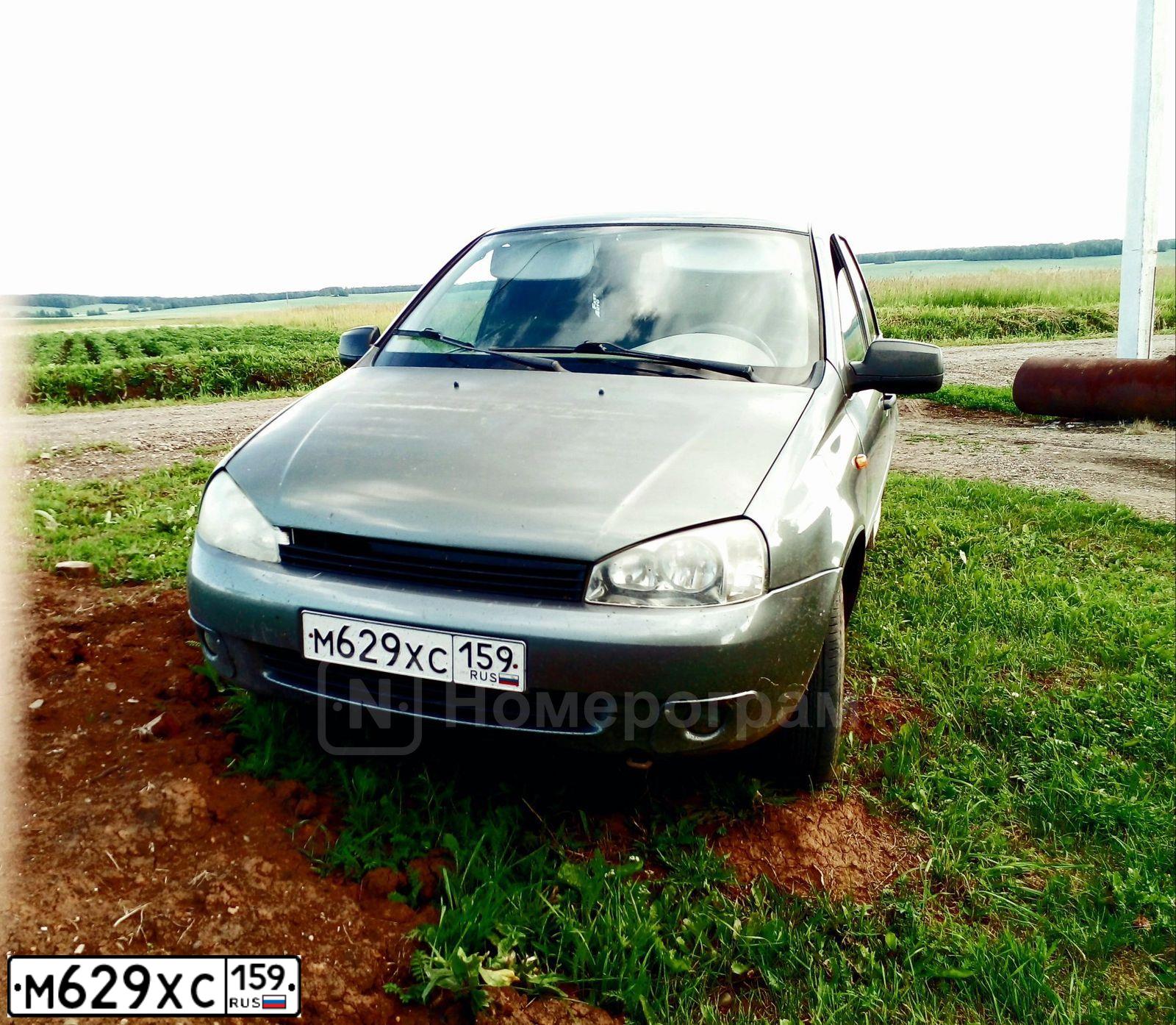 Фото автомобиля LADA 1117 KALINA, 2009 — госномер М629ХС159. Цвет: Темно-серый металлик