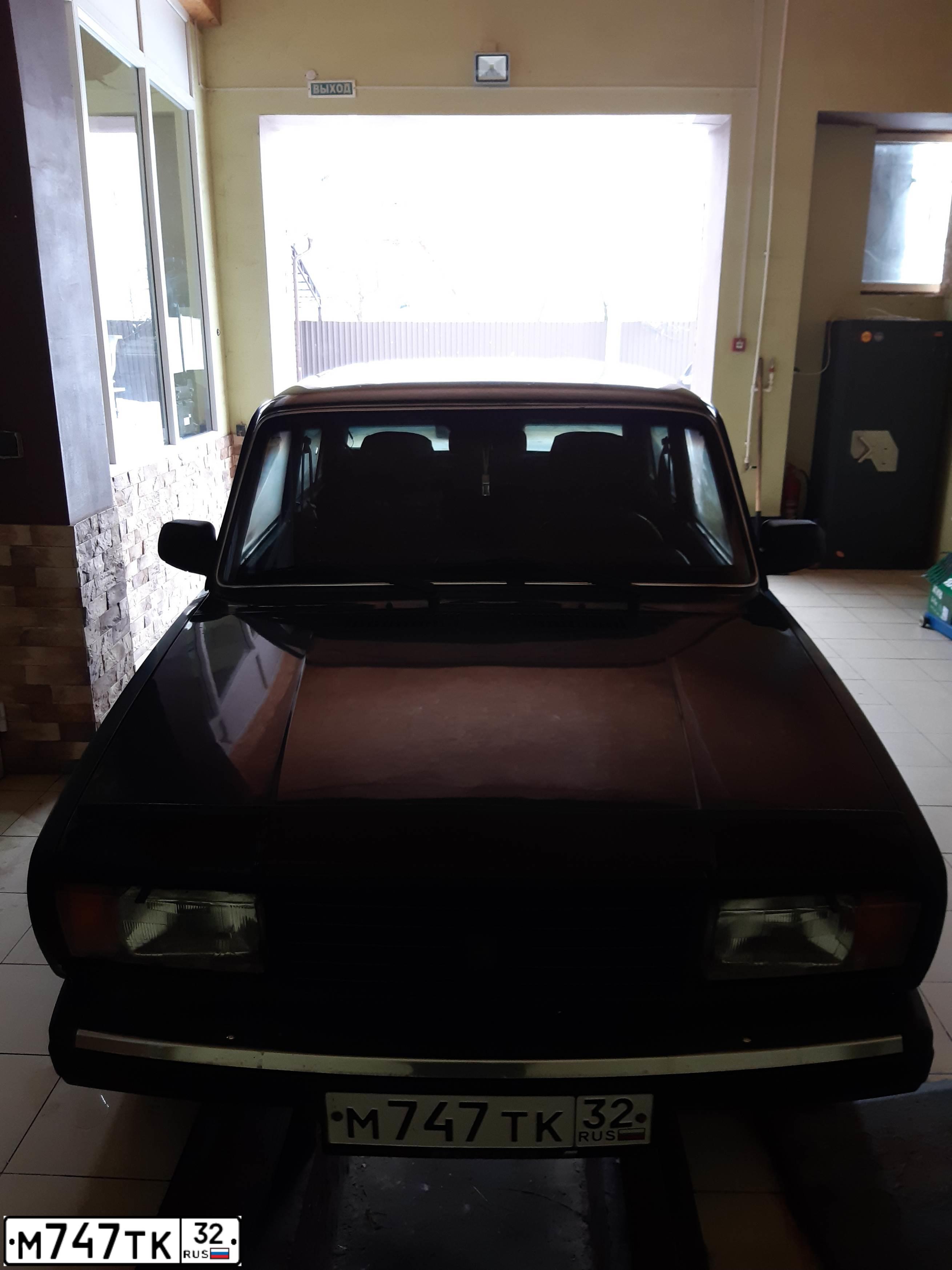 Фото автомобиля LADA 2107 LADA, 2007 — госномер Н410ТТ40. Цвет: Темно-зеленый