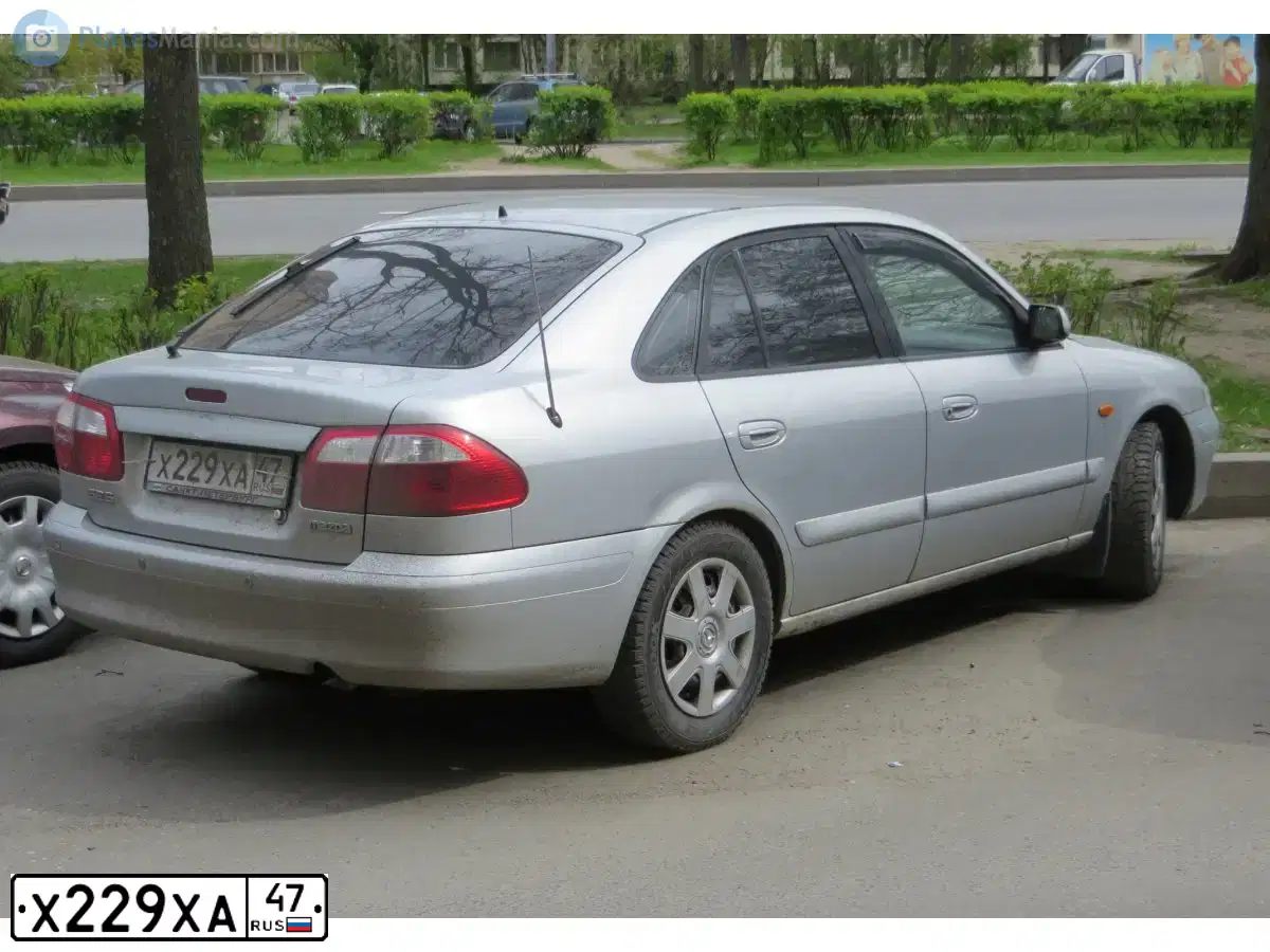 Фото автомобиля MAZDA A 626, 2000 — госномер В395ХХ47. Цвет: СЕРЕБРИСТЫЙ