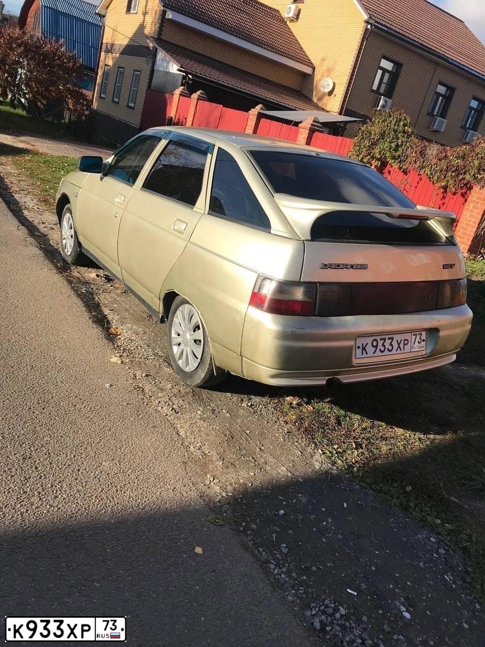 Фото автомобиля LADA 2112, 2006 — госномер Х118НУ30. Цвет: СЕРЕБРИСТО-БЕЖЕВЫЙ