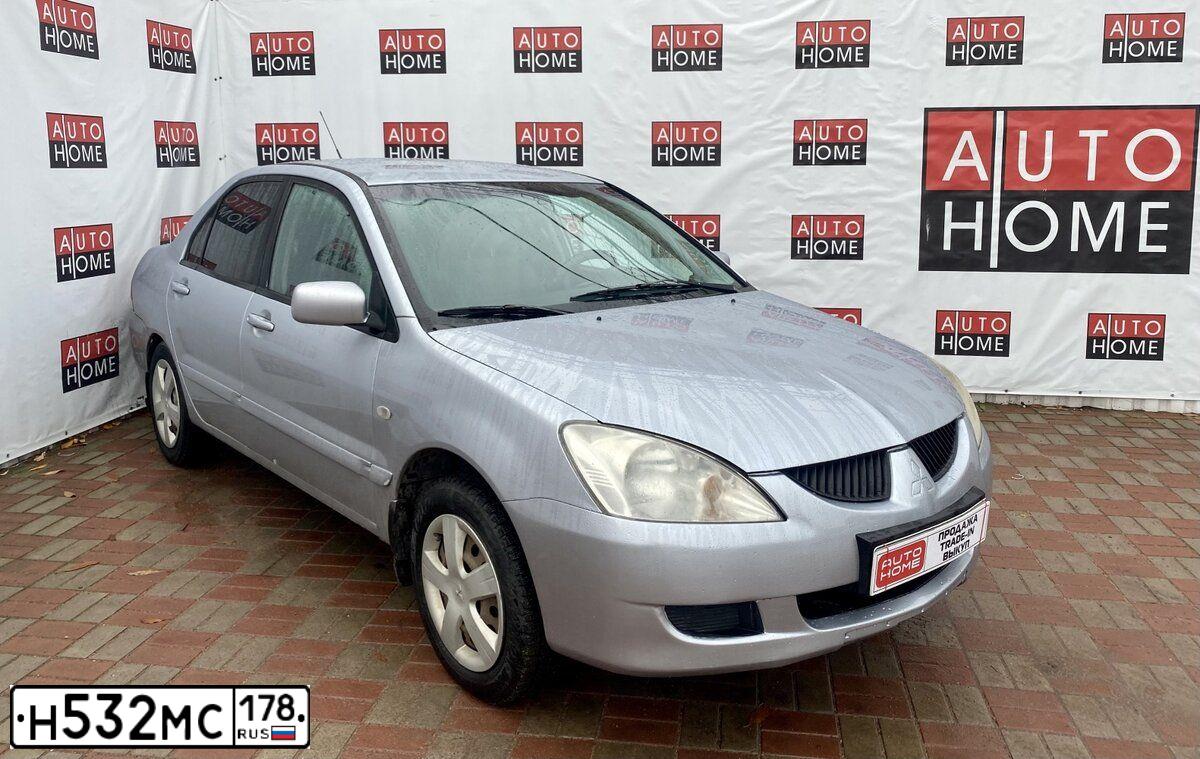 Фото автомобиля MITSUBISHI LANCER, 2004 — госномер А210МА60. Цвет: СЕРЕБРИСТЫЙ