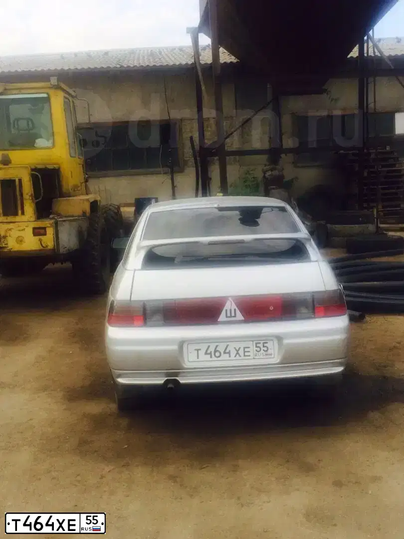 Фото автомобиля LADA 2112, 2005 — госномер Т464ХЕ55. Цвет: СВЕТЛО-СЕРЫЙ