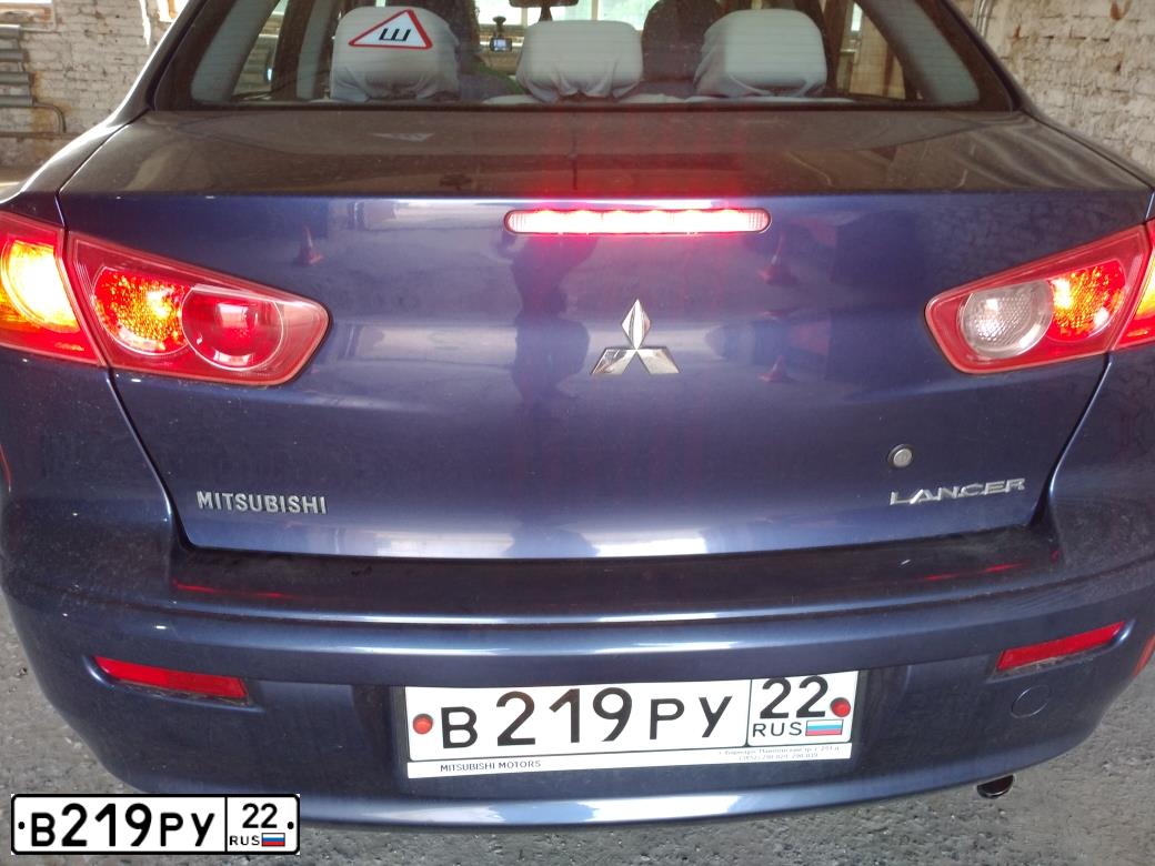 Фото автомобиля MITSUBISHI LANCER, 2008 — госномер Х132ЕХ154. Цвет: синий