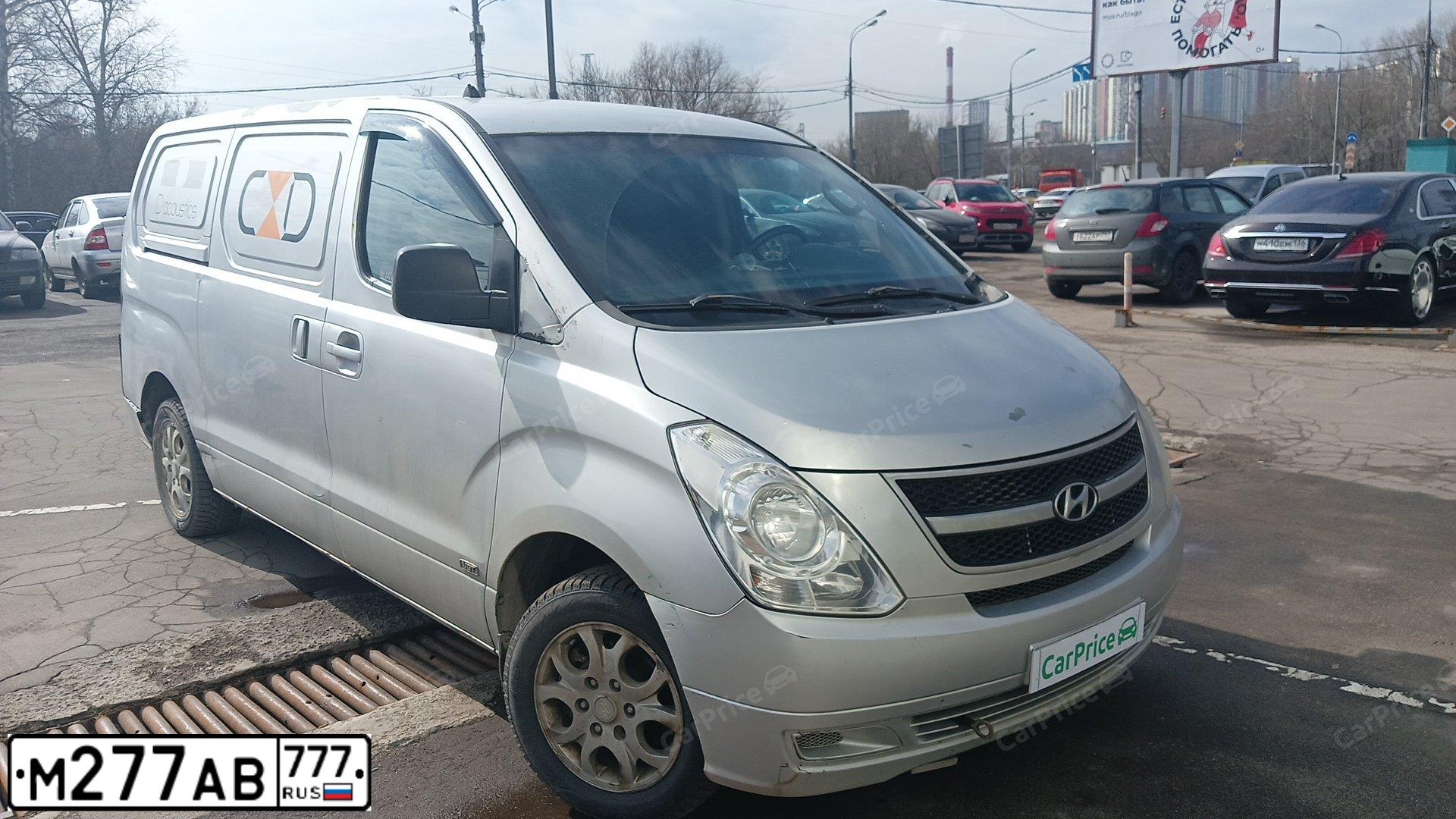 Фото автомобиля HYUNDAI GRAND STAREX, 2008 — госномер М277АВ777. Цвет: Серый