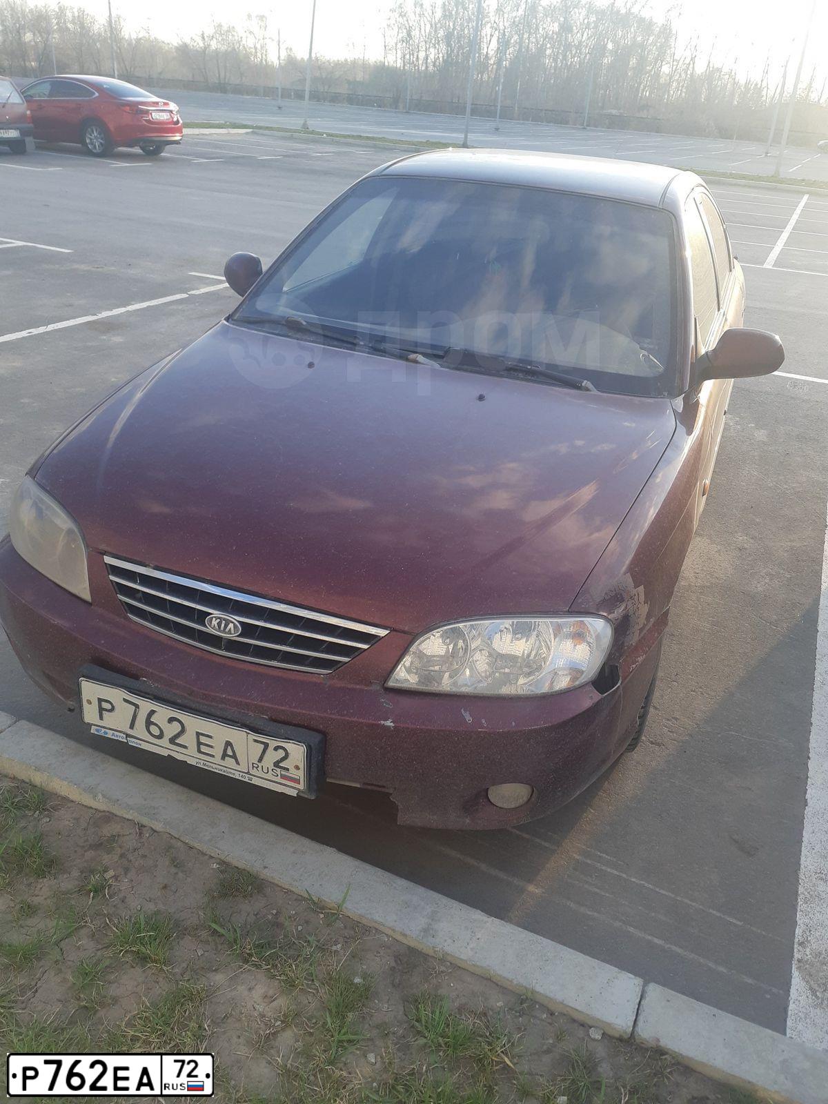 Фото автомобиля KIA SPECTRA, 2006 — госномер Н214ТН72. Цвет: КРАСНЫЙ ПЕРЕЦ (КРАСНЫЙ)