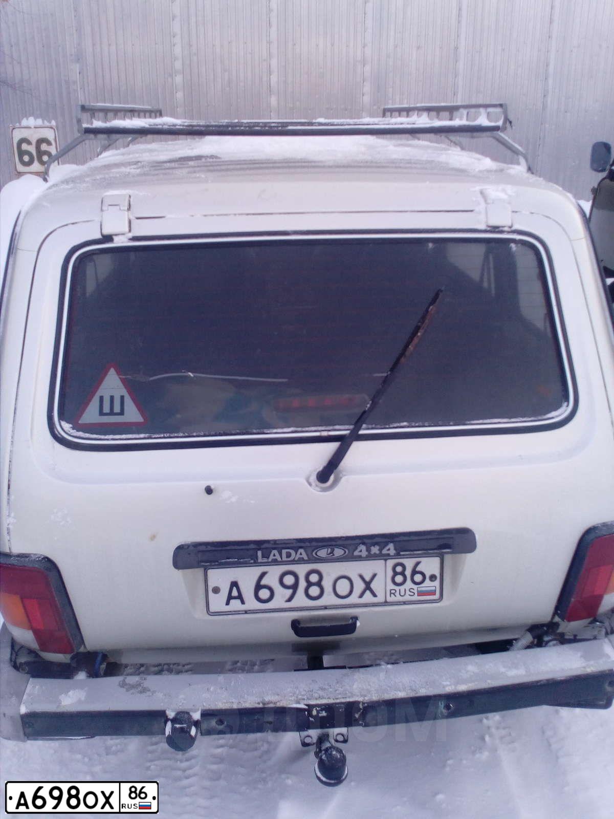 Фото автомобиля LADA 2131 NIVA, 2006 — госномер Е446СК82. Цвет: СЕРЕБРИСТО-БЕЖЕВЫЙ