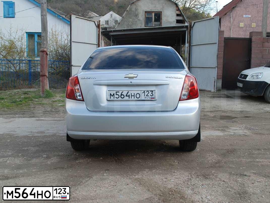 Фото автомобиля CHEVROLET LACETTI, 2004 — госномер А102УВ92. Цвет: Серебристый