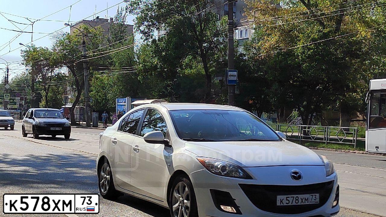 Фото автомобиля MAZDA 3, 2011 — госномер М564СС763. Цвет: Белый