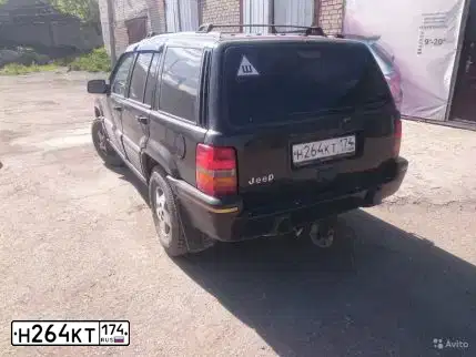 Фото автомобиля JEEP GRAND CHEROKEE, 1993 — госномер А123ВС74. Цвет: ЧЕРНЫЙ