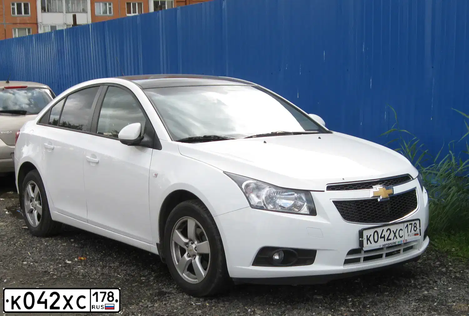 Фото автомобиля CHEVROLET CRUZE, 2012 — госномер Р174ММ136. Цвет: Белый