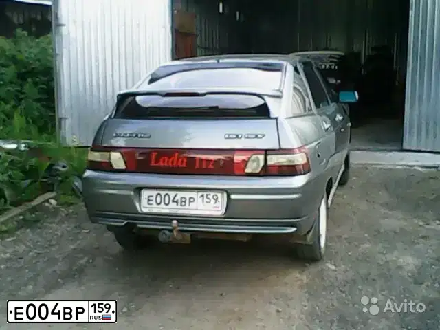 Фото автомобиля LADA 2112 LADA, 2007 — госномер М303МУ45. Цвет: СРЕДНИЙ СЕРО-ЗЕЛЕНЫЙ МЕТ