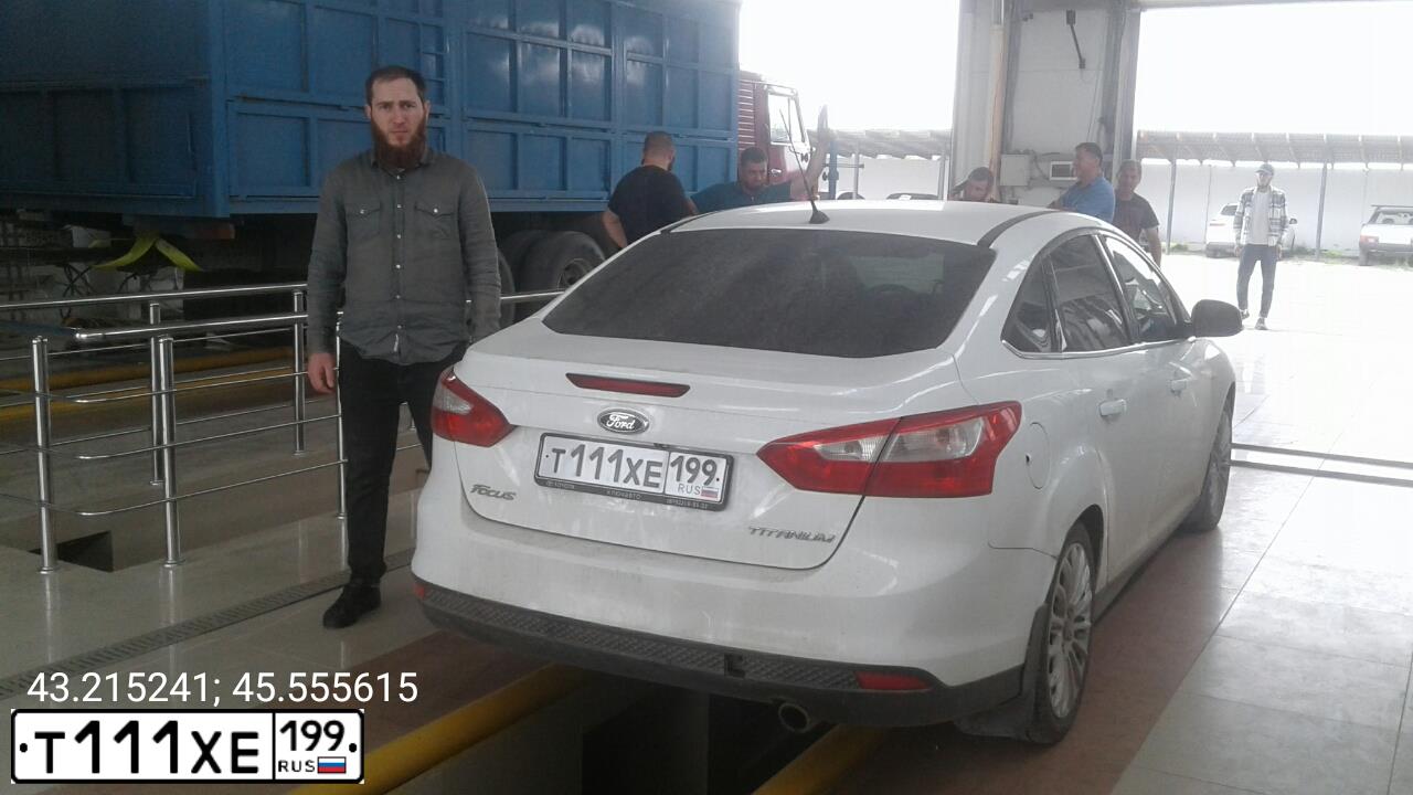 Фото автомобиля TOYOTA CAMRY, 2003 — госномер Т111ХЕ199. Цвет: ЧЕРНЫЙ