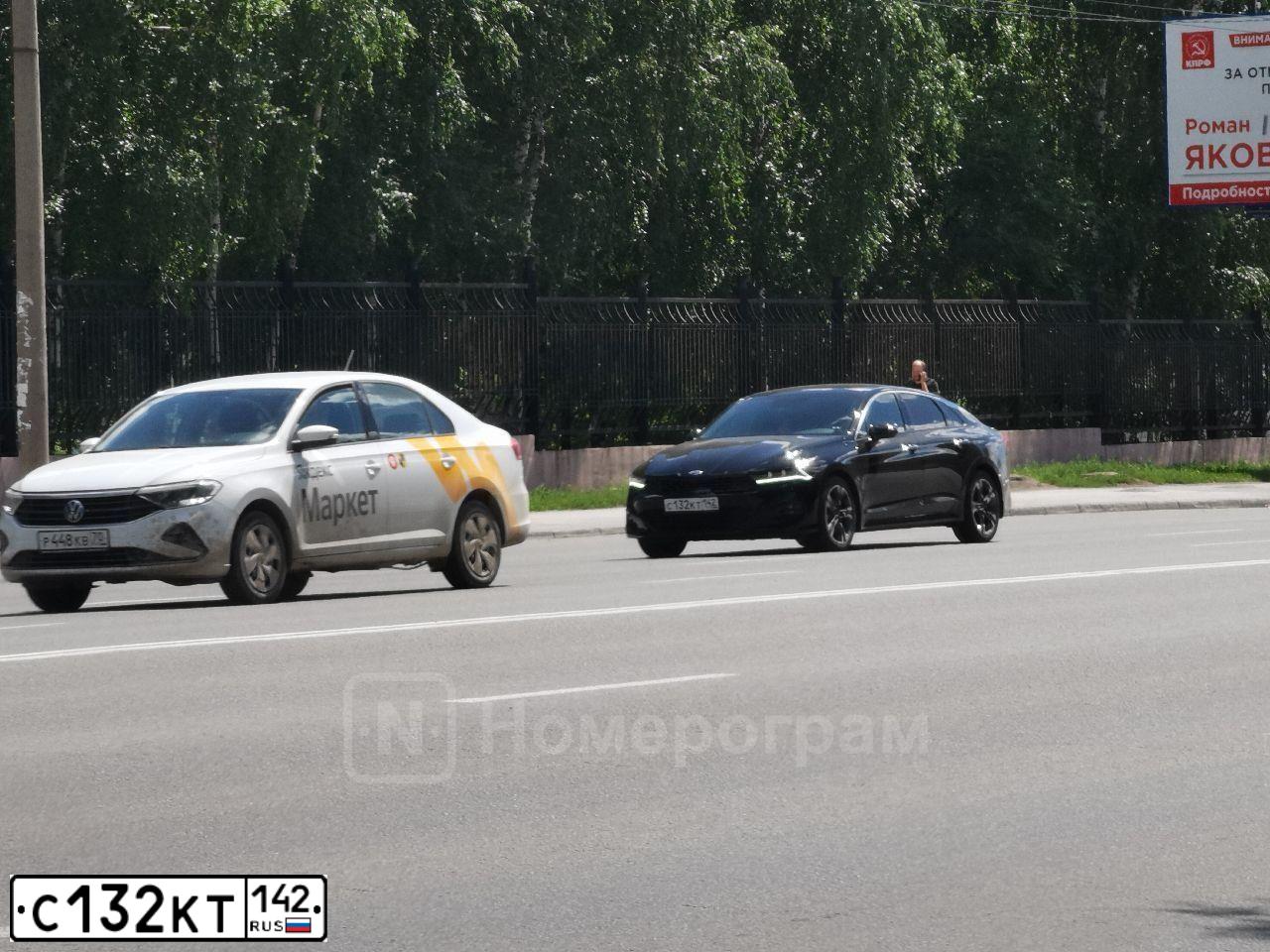 Фото автомобиля KIA K5, 2020 — госномер А701УА124. Цвет: ЧЕРНЫЙ