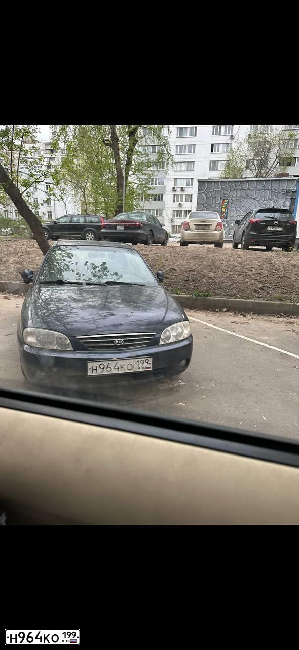 Фото автомобиля KIA SPECTRA, 2008 — госномер Н964КО199. Цвет: ТЕМНО-СИНИЙ
