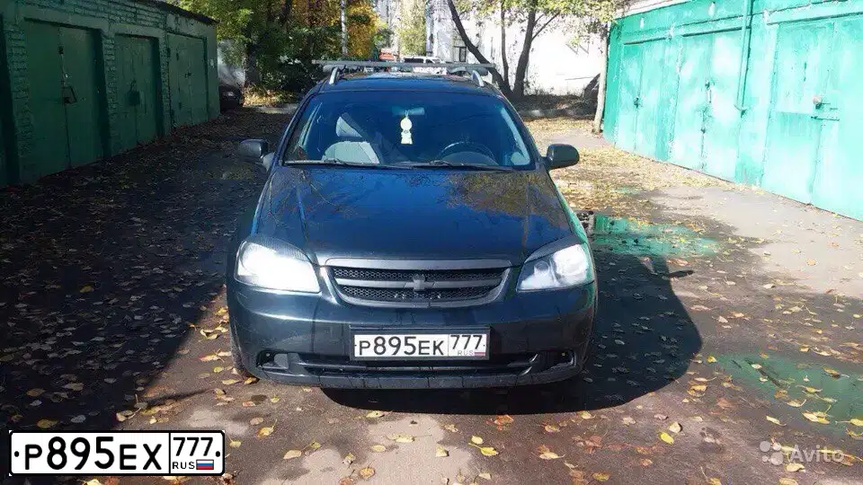 Фото автомобиля NISSAN QASHQAI, 2014 — госномер Р895ЕХ777. Цвет: КРАСНЫЙ