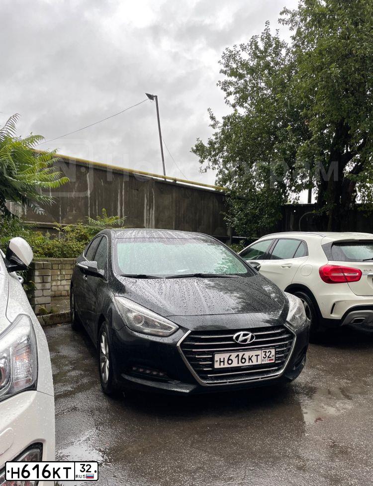 Фото автомобиля HYUNDAI I40, 2015 — госномер Н616КТ32. Цвет: ЧЕРНЫЙ