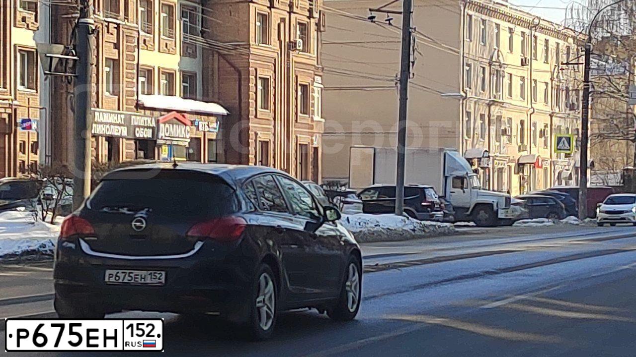 Фото автомобиля OPEL ASTRA, 2010 — госномер Р675ЕН152. Цвет: ЧЕРНЫЙ