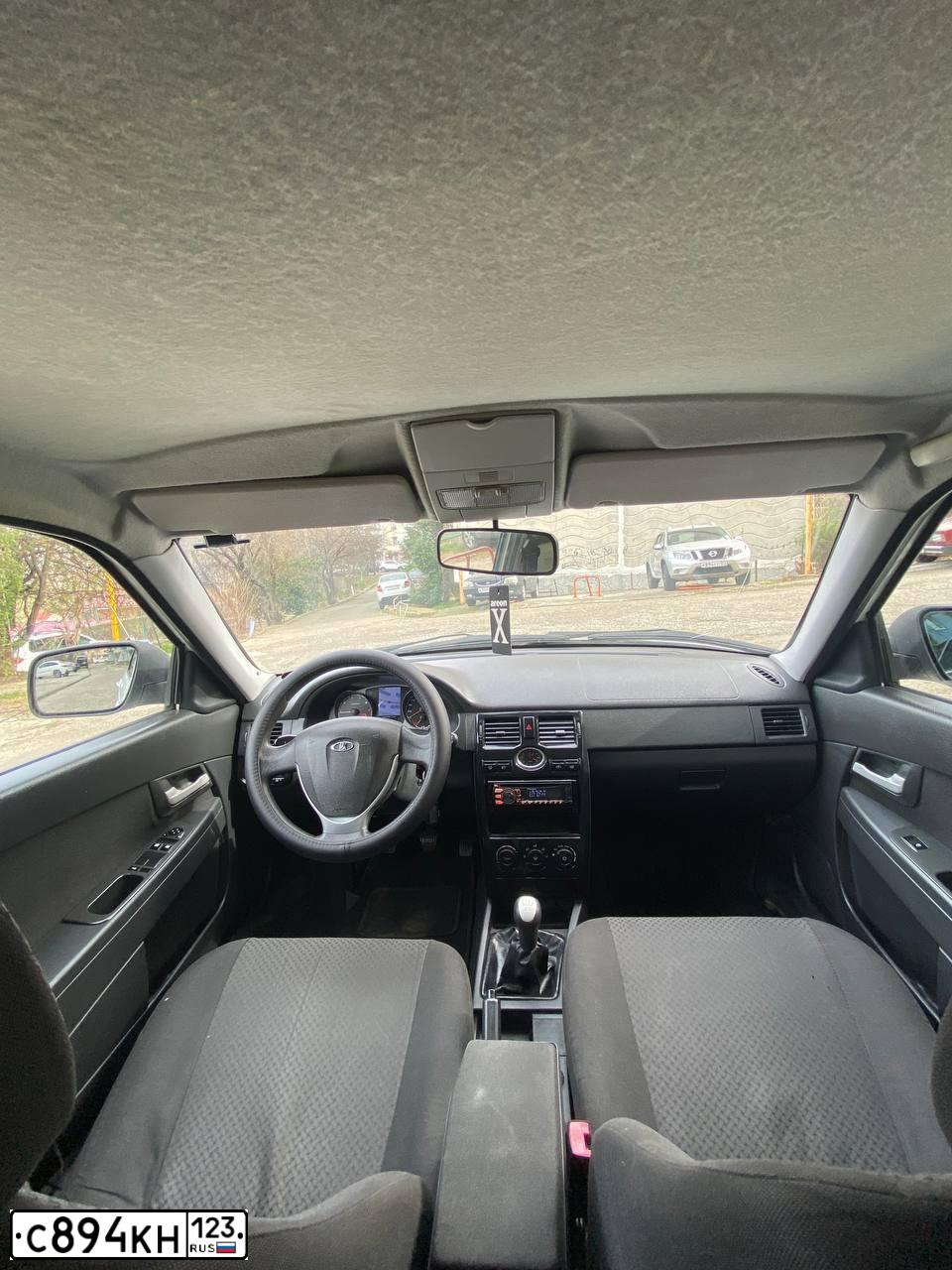 Фото автомобиля LADA PRIORA, 2012 — госномер Е114НУ761. Цвет: Белый