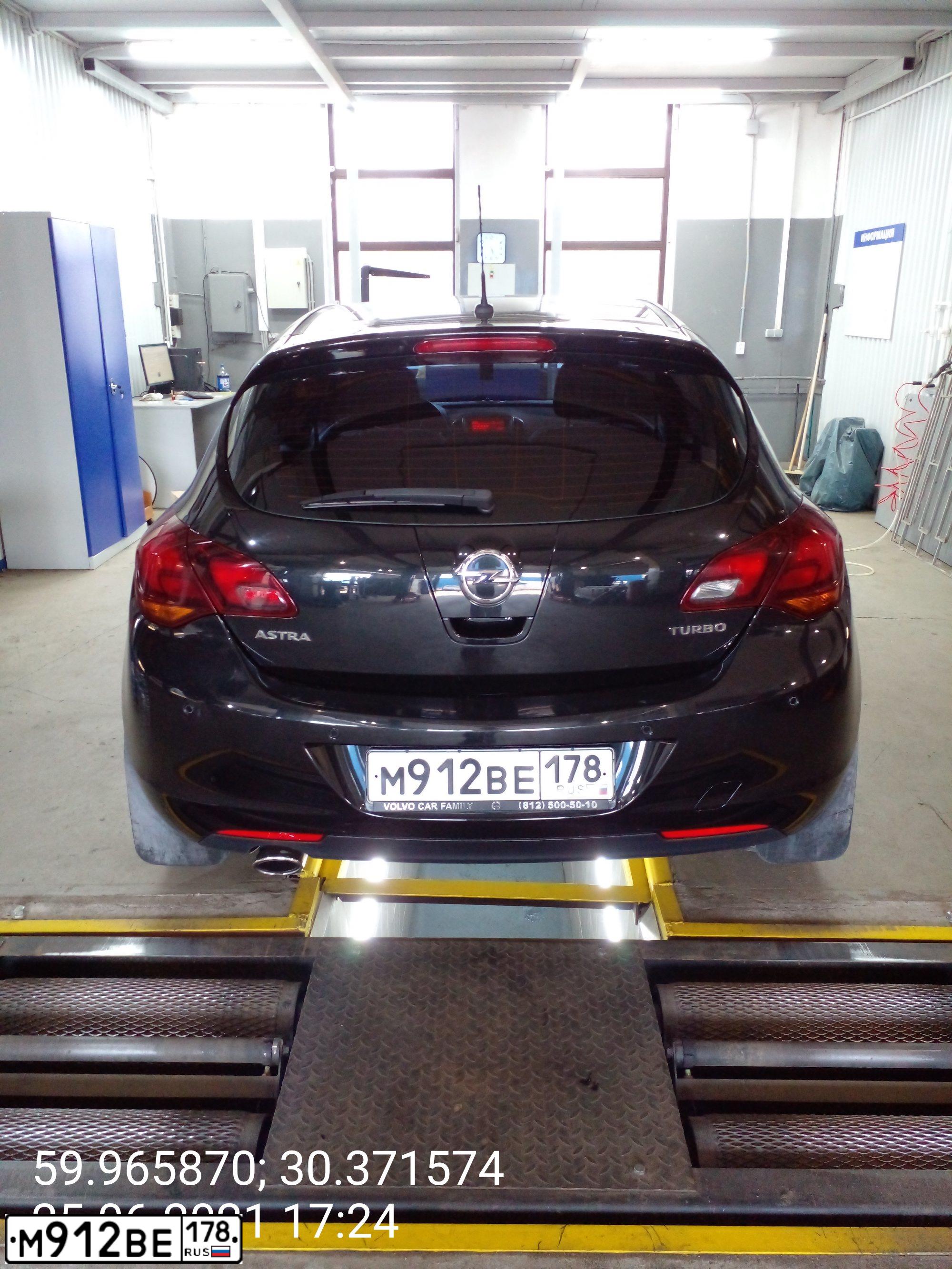 Фото автомобиля OPEL ASTRA, 2012 — госномер М912ВЕ178. Цвет: ЧЕРНЫЙ МЕТАЛЛИК