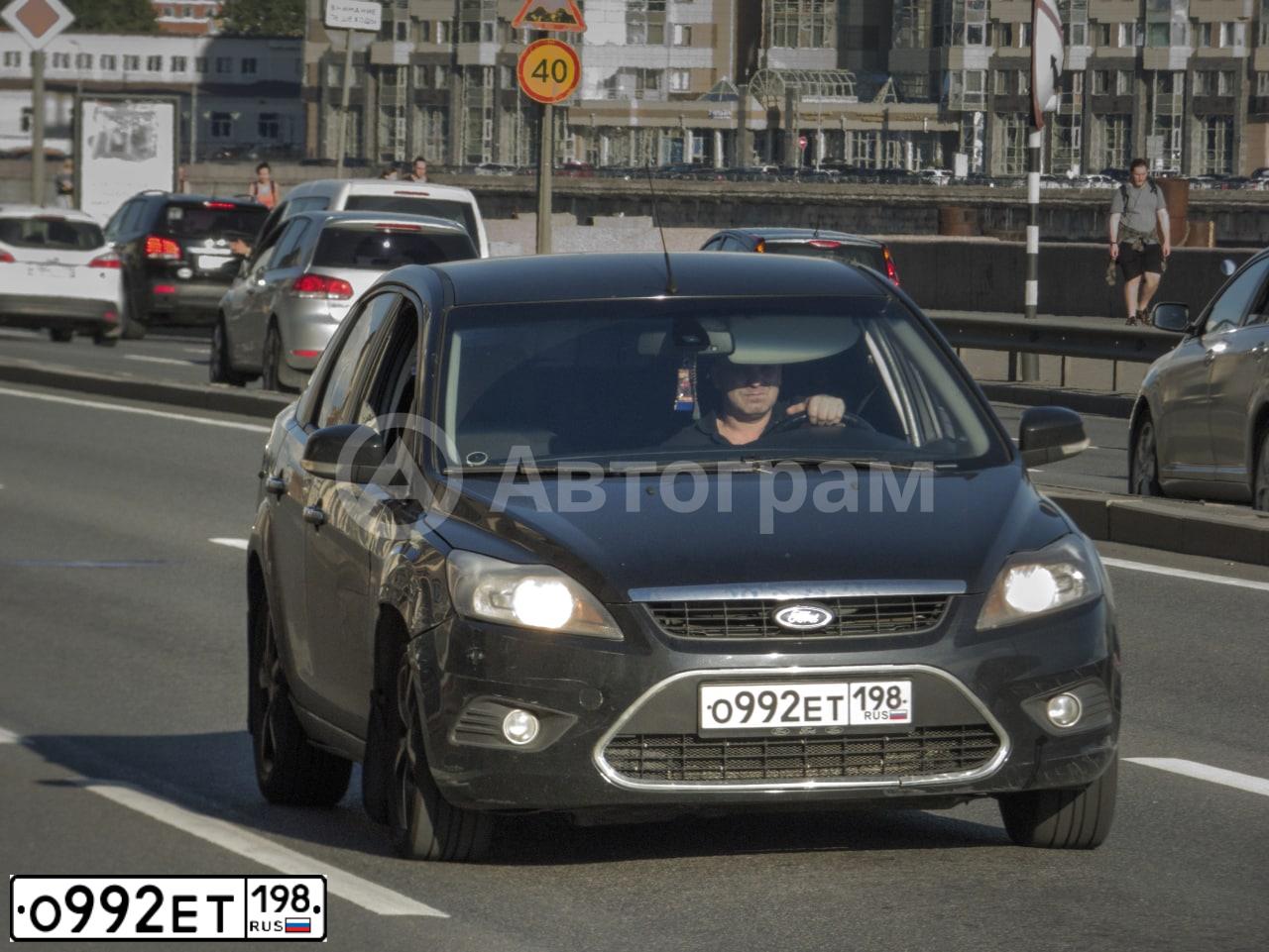 Фото автомобиля FORD FOCUS, 2009 — госномер О992ЕТ198. Цвет: ЧЕРНЫЙ