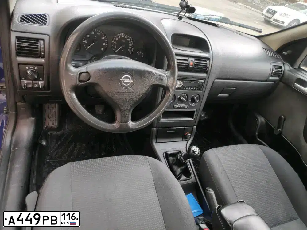 Фото автомобиля OPEL ASTRA, 2004 — госномер М162РС21. Цвет: синий
