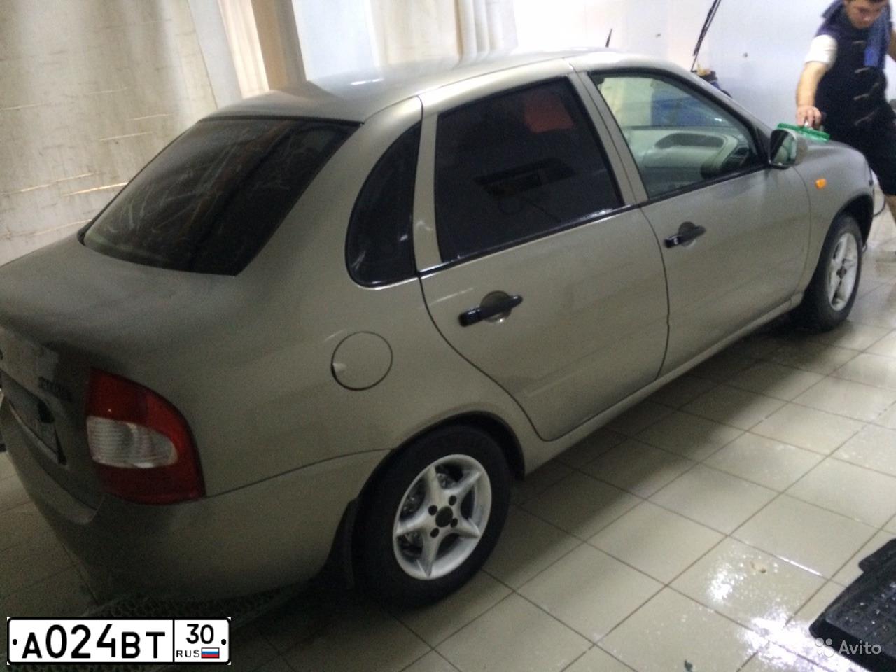 Фото автомобиля LADA 1118 KALINA, 2006 — госномер А024ВТ30. Цвет: БЕЖЕВО-СЕРЫЙ