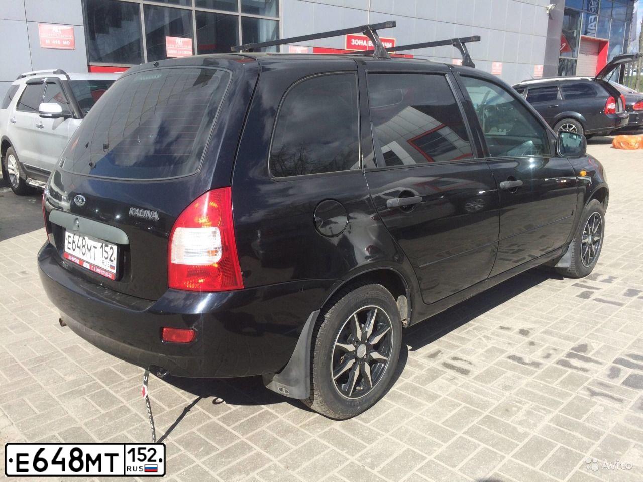 Фото автомобиля LADA 1117 KALINA, 2011 — госномер Р649РТ57. Цвет: Сине-Черный