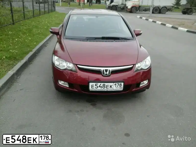 Фото автомобиля HONDA CIVIC, 2007 — госномер Е506СМ123. Цвет: ТЕМНО-КРАСНЫЙ